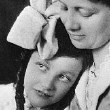 Age 9, with her mother. Circa 1914.