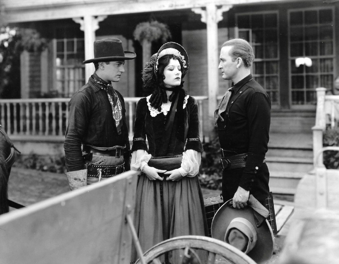1928. 'The Law of the Range.' With Rex Lease, left, and Tim McCoy.