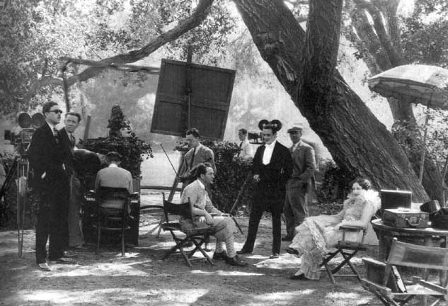 According to Walker bio, on the set of 'The Circle,' with director Frank Borzage, center, and Joan, right.