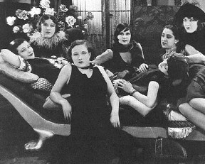 Joan, front, with Parisian "grisettes."