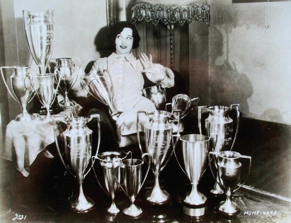 1926. Surrounded by dance trophies won at local Hollywood clubs.