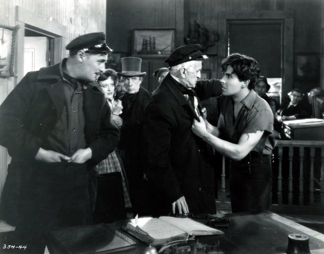 1928. 'Across to Singapore.' Ramon Novarro at far right.