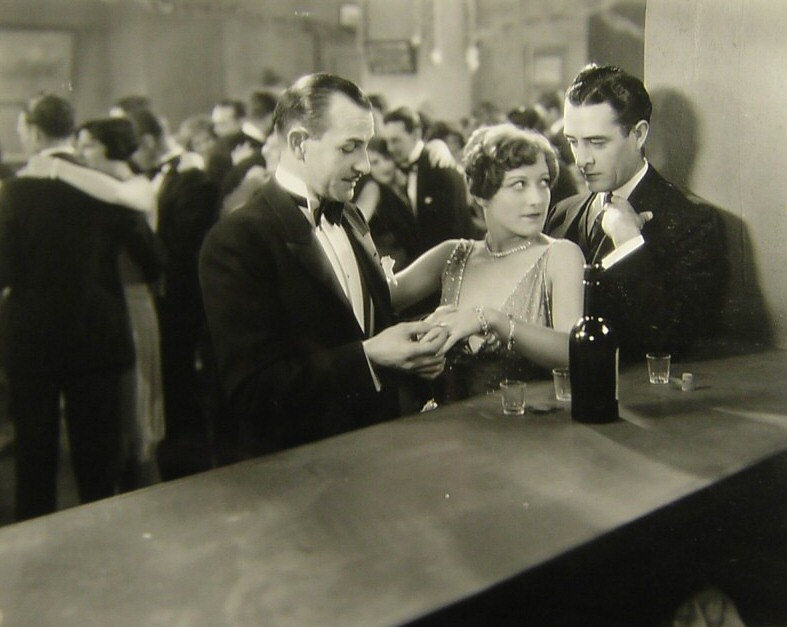 1928. 'Four Walls.' With Louis Natheaux and John Gilbert, right.