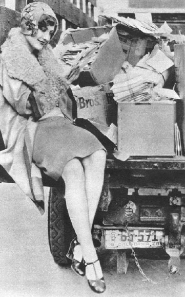 1928 publicity picture. Joan photo superimposed over a mail-truck.