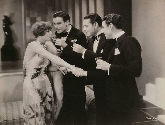 1928, 'Our Dancing Daughters,' with Nils Asther and 2 unidentified players.