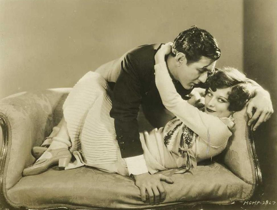 1928. 'Our Dancing Daughters' publicity, with Johnny Mack Brown.