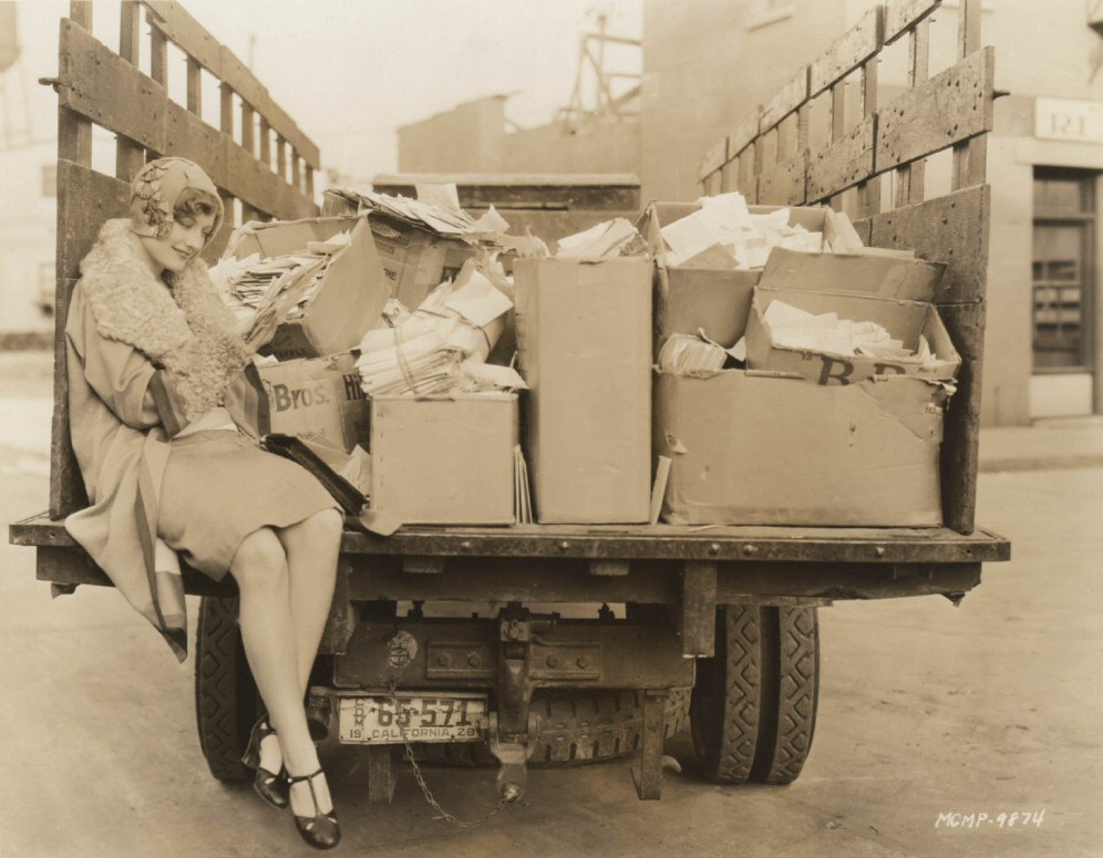 1928 on the MGM lot with her fan mail.