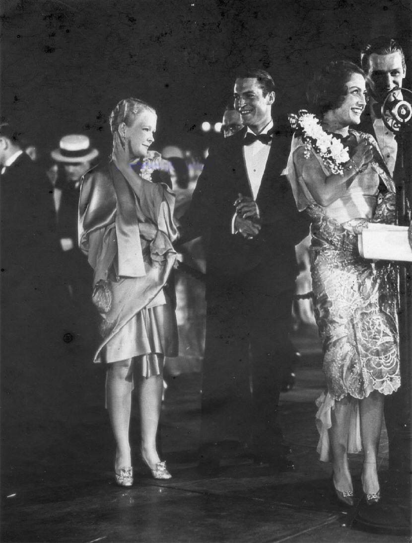 August 1929. The premiere of 'Hollywood Revue of 1929' at Grauman's. Joan and Doug at right. Chester Morris and wife Suzanne Kilbourne at center.