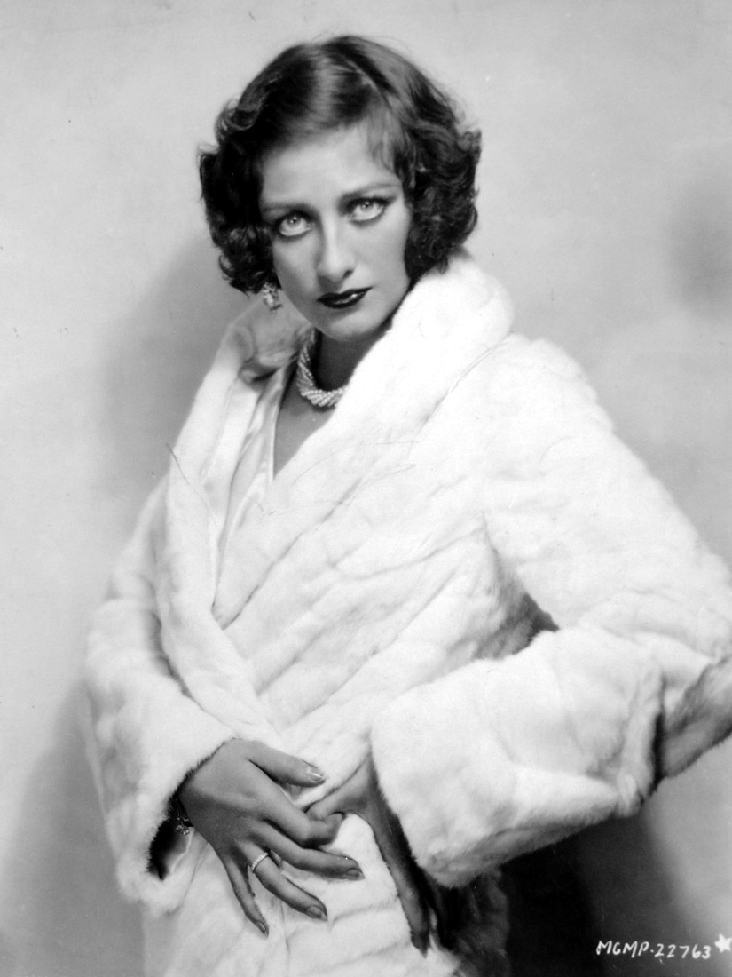 1929. In ermine fur. Shot by Ruth Harriet Louise.
