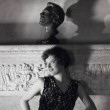 1929. At home with husband Doug's bust. Shot by Ruth Harriet Louise.