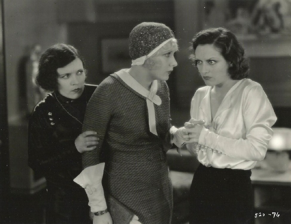 1930. 'Paid.' Marie Prevost at left.