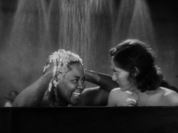 1930. 'Paid.' With Louise Beavers. 'Don't worry, honey, it all goes down the drain.'