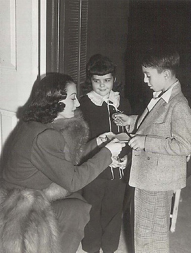 1938. With Our Gang's Darla Hood and Alfalfa.