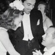 1937. With Cesar Romero and Robert Montgomery.