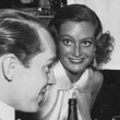 June 1933 at the Stork Club. With Franchot Tone and Helen Hayes.