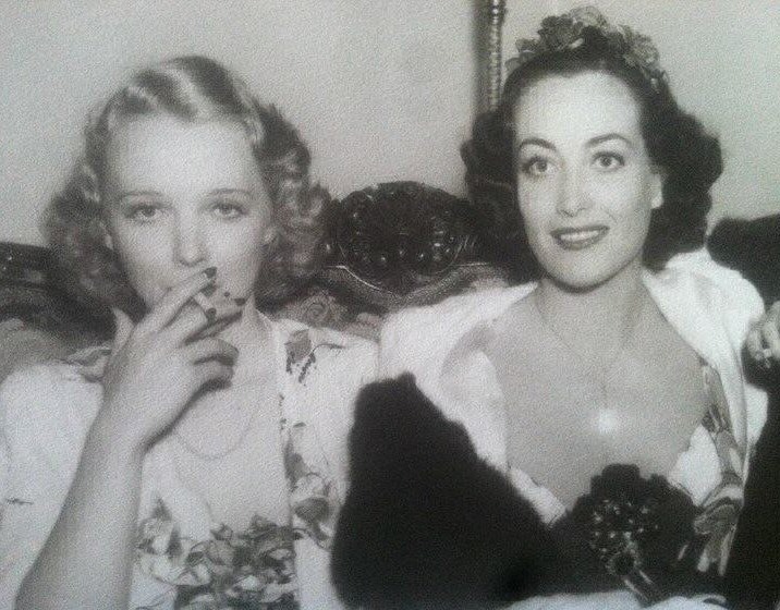 April 19, 1936, at the Beverly Wilshire Mayfair Ball with Virginia Bruce.