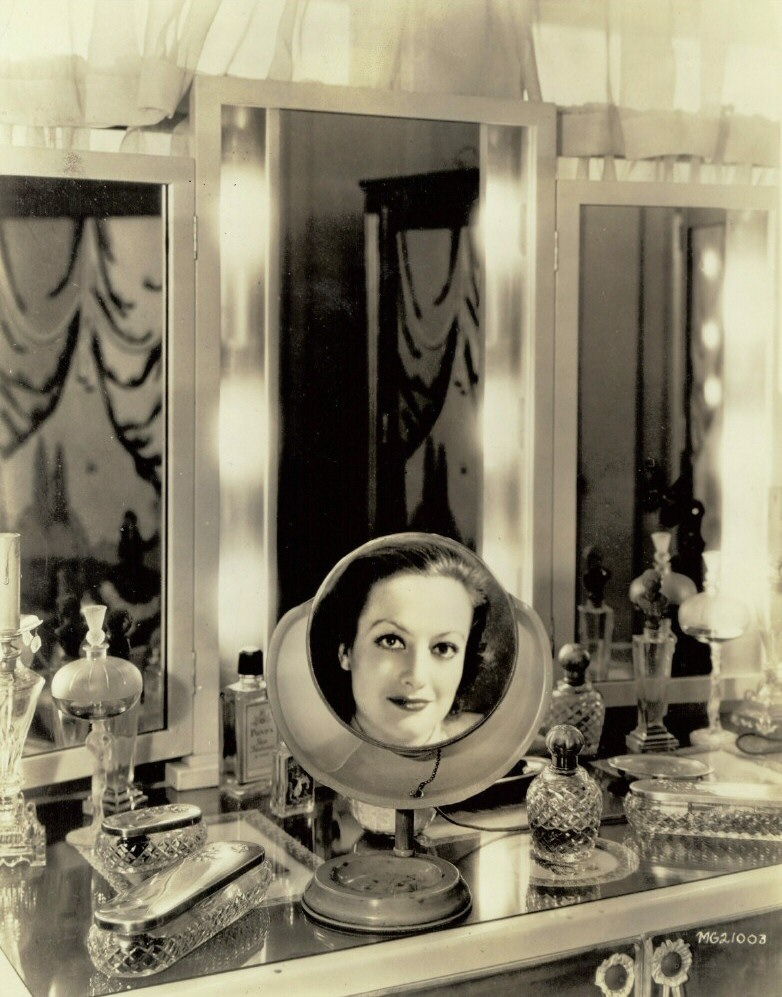 1931. MGM publicity by Hurrell, shot in Joan's dressing room.