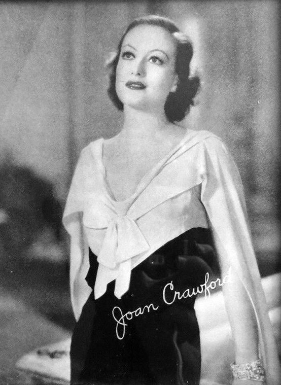 1931. 'Possessed.' A publicity postcard of the still at left.