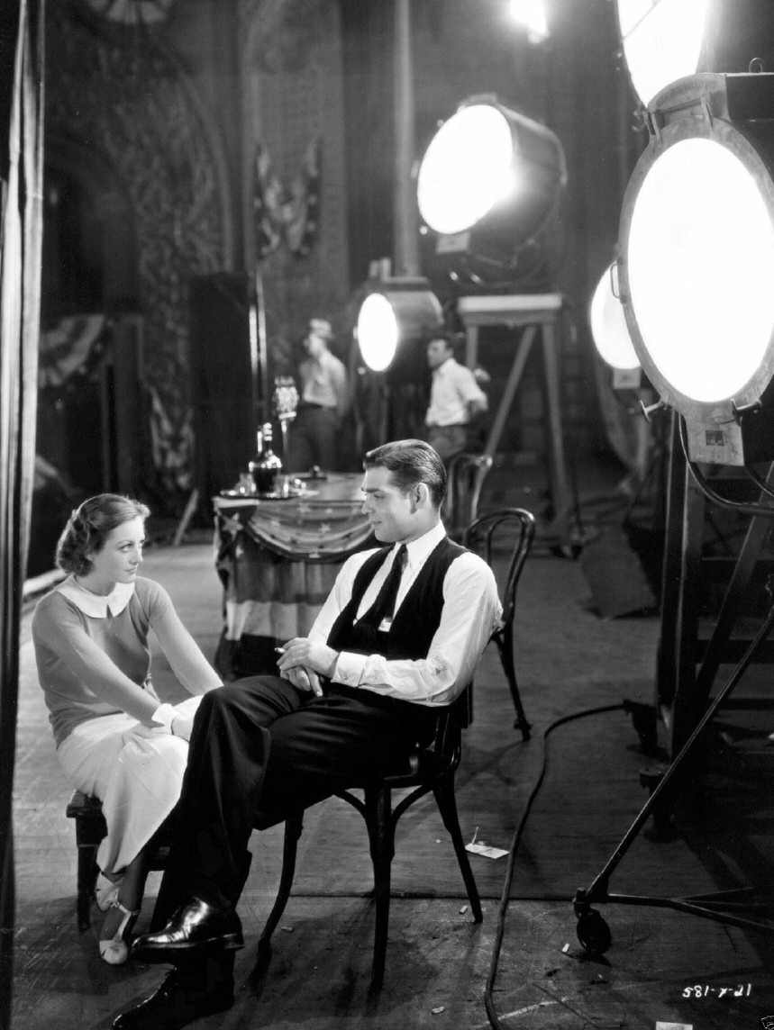 1931. On the set of 'Possessed' with Clark Gable.