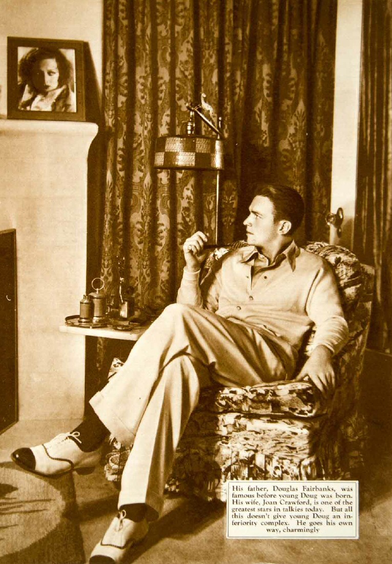 Husband Douglas Fairbanks, Jr., at home in 1931.