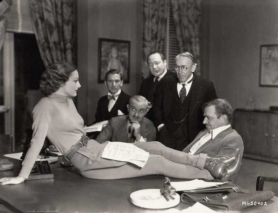 1932. On the set of 'Grand Hotel.' With Wallace Beery, right.