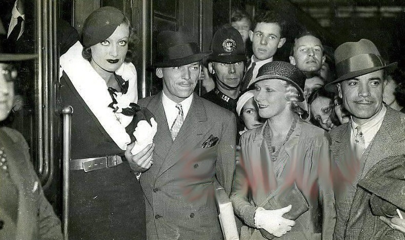 July 1932 at Victoria Station with husband Doug and British actress Heather Thatcher.