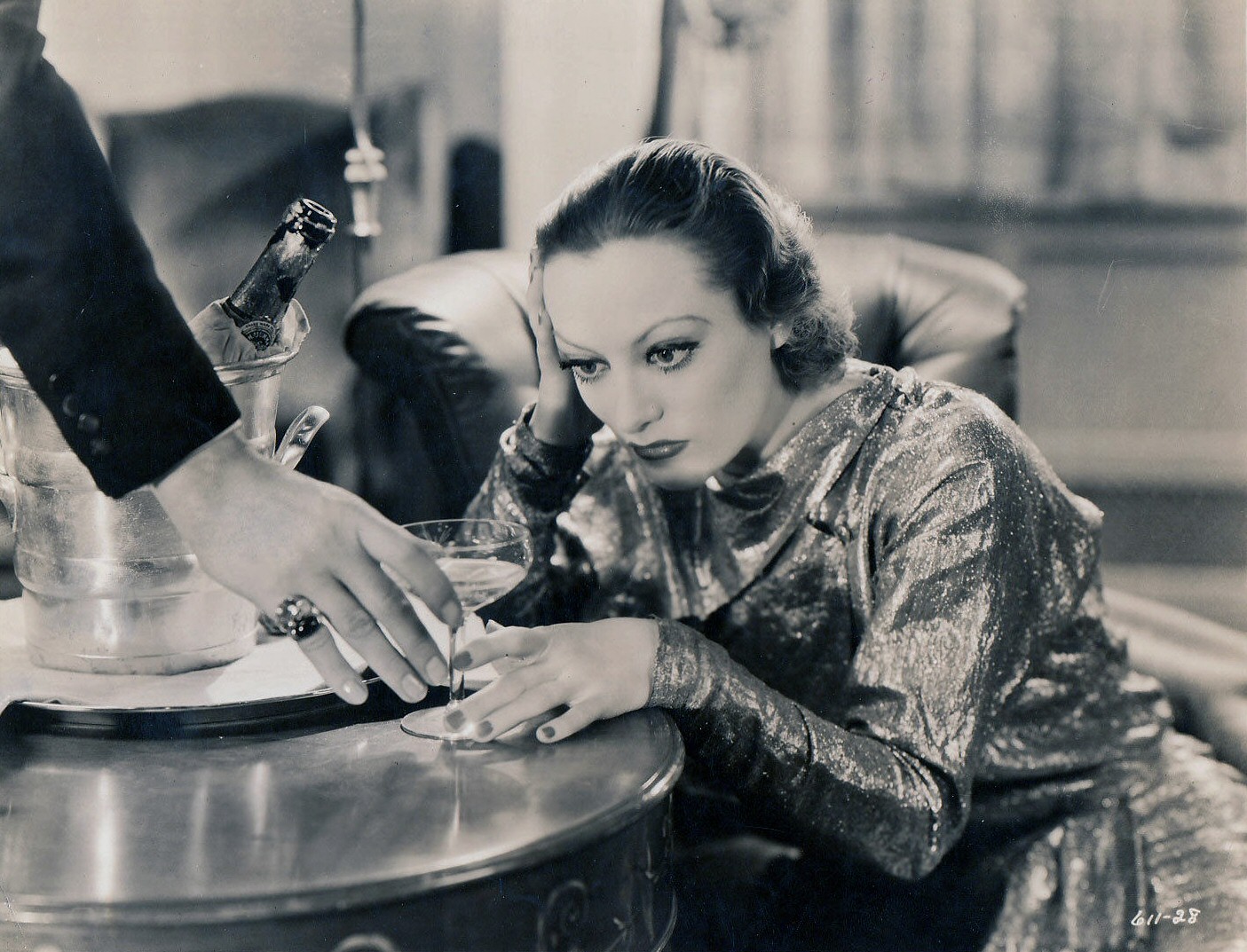 1932. A film still from 'Letty Lynton.' Hand by Nils Asther.