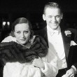 1931. At a premiere with William Haines, husband Doug Fairbanks, Jr., and Ivor Novello.