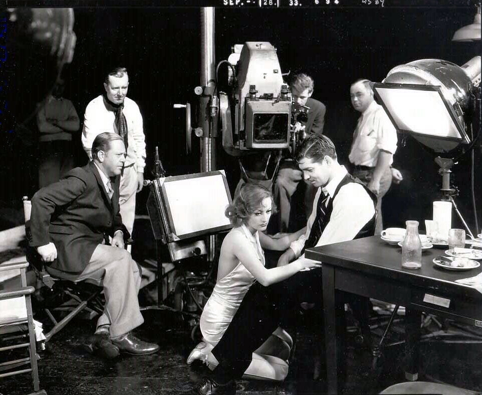 1933. On the set of 'Dancing Lady' with director Robert Z. Leonard and Clark Gable.