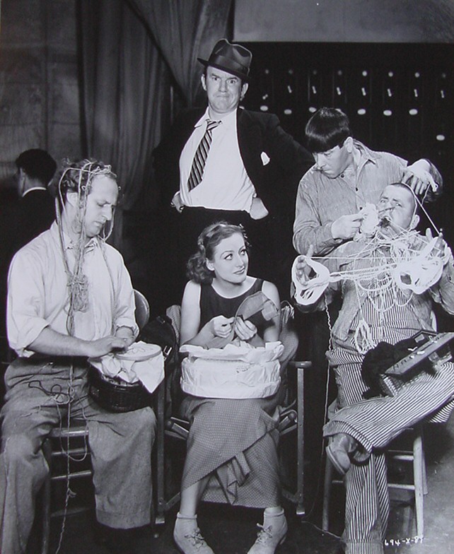 1933. On the set of 'Dancing Lady' with the Three Stooges.
