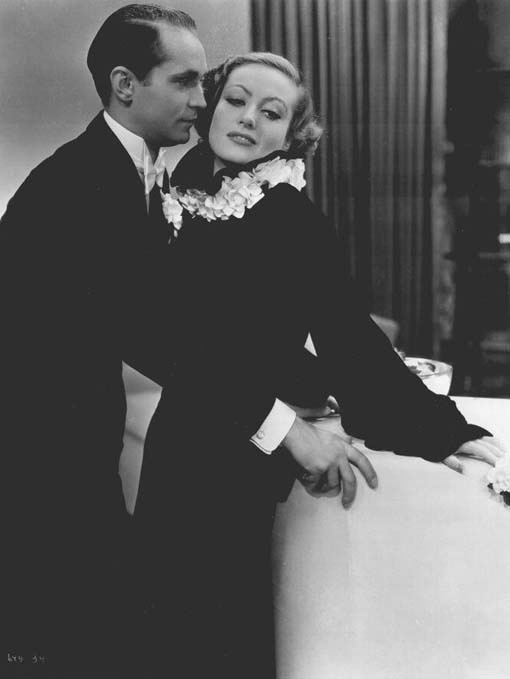 With Franchot Tone.
