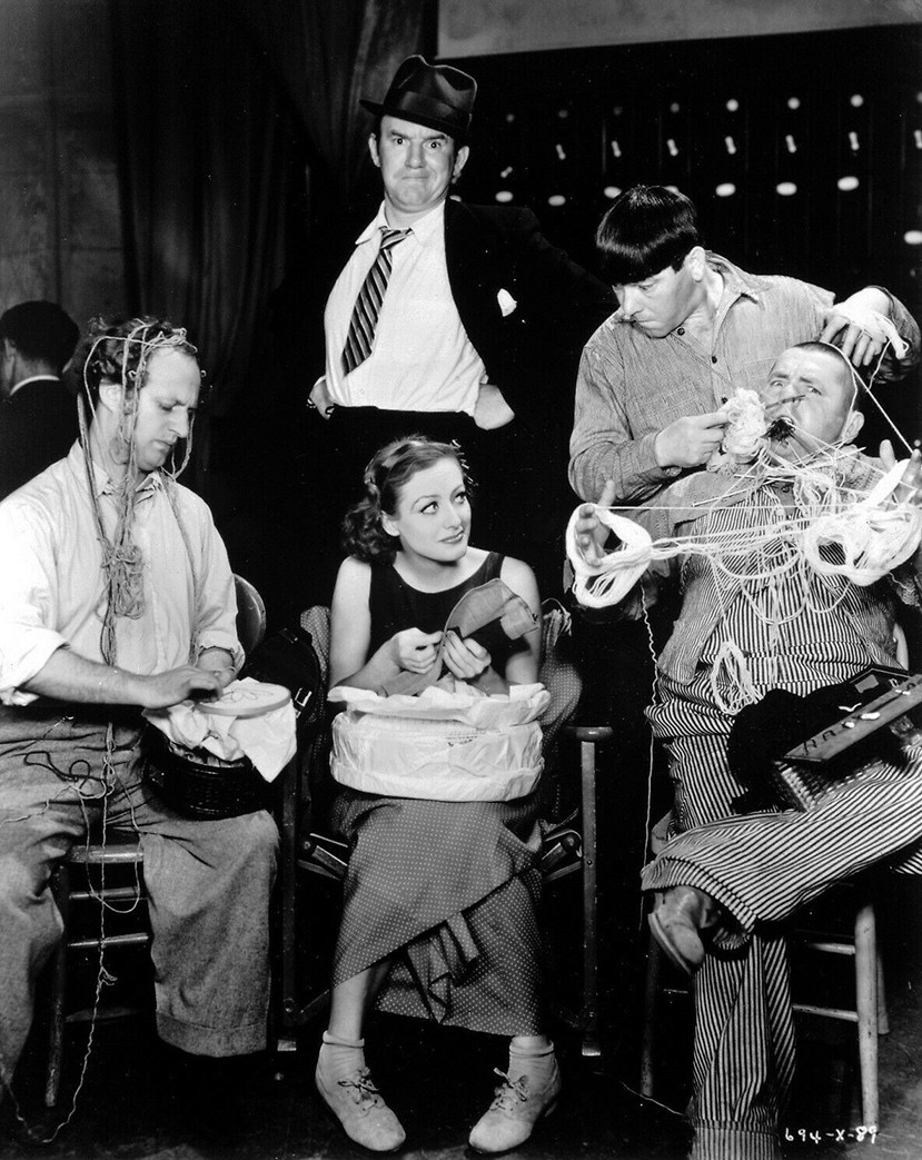 1933. On the set of 'Dancing Lady' with Ted Healy (top) and his Stooges.