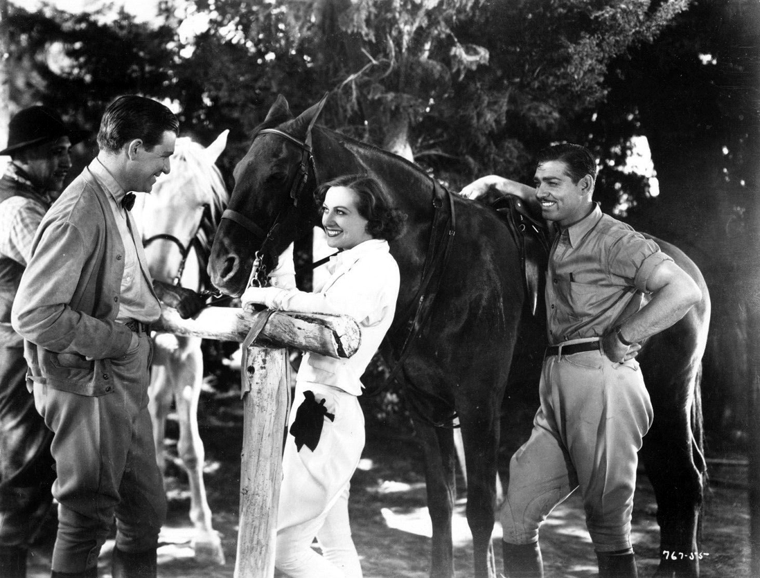 1934. 'Chained.' With Clark Gable (right) and Stuart Erwin.