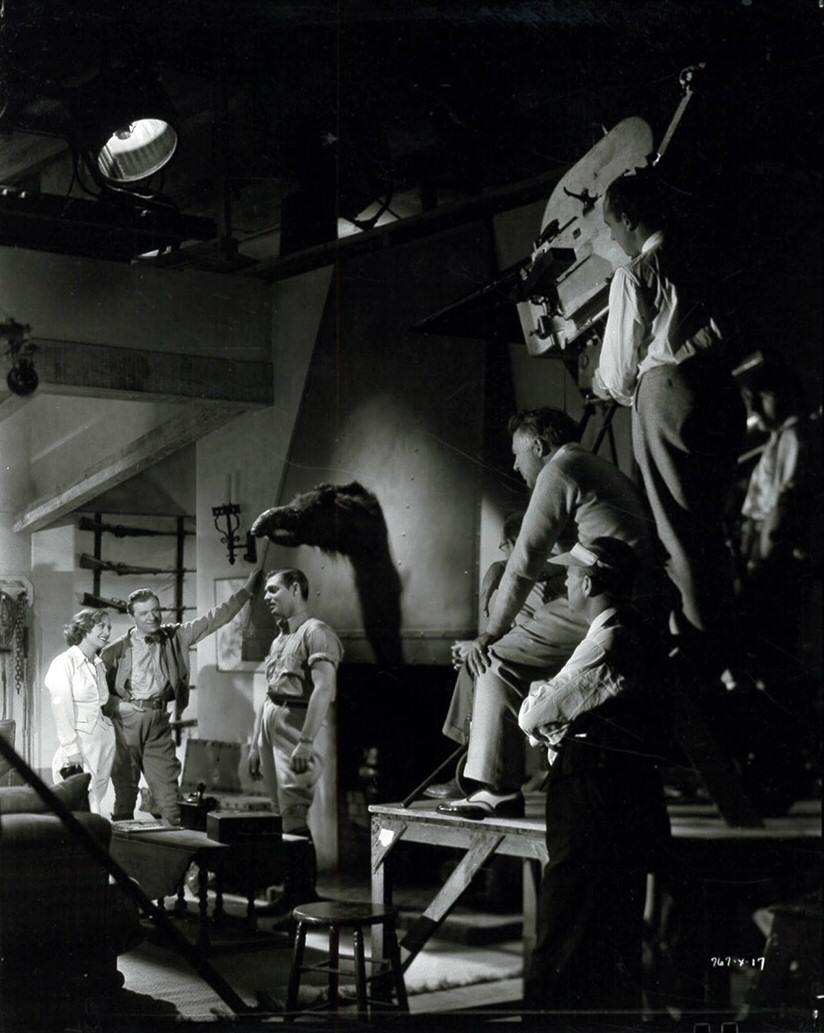 1934. On the set of 'Chained' with Gable, Stuart Erwin, director Brown.