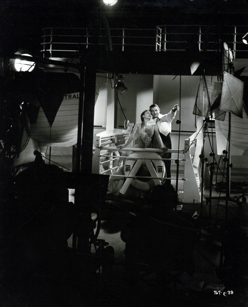 1934. Filming 'Chained.'