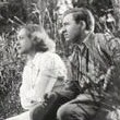 1934. On the set of 'Chained' with director Clarence Brown, left, and Stuart Erwin.