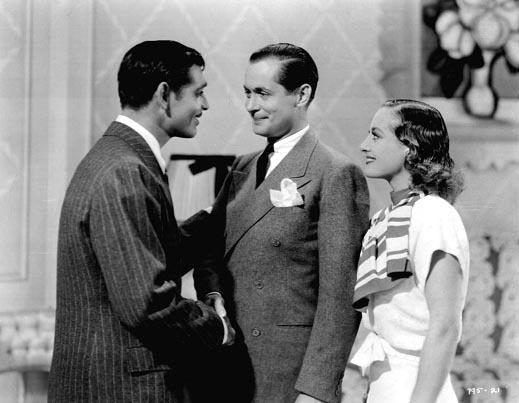 With Clark Gable and Robert Montgomery.