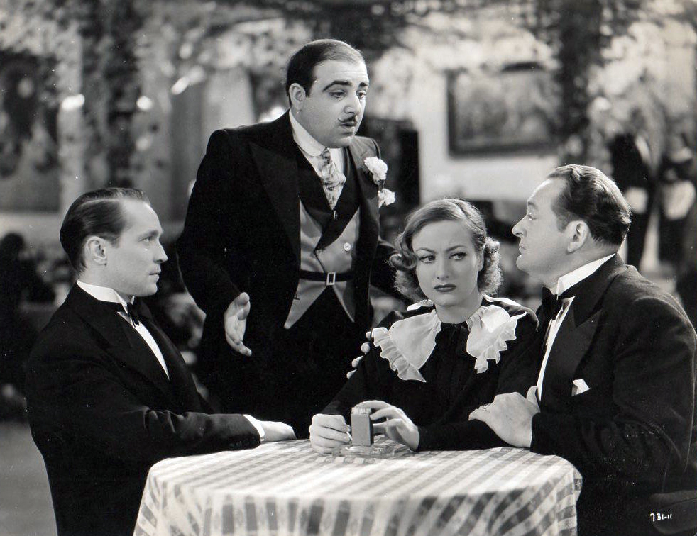 1934. 'Sadie McKee.' With Franchot Tone, left, and Edward Arnold, right.