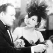 1934. 'Sadie McKee.' With Edward Arnold (left).