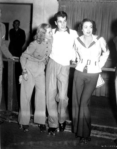 1935. Culver City Rollerdome party for Ginger Rogers. Alfred Gwynne Vanderbilt, center.