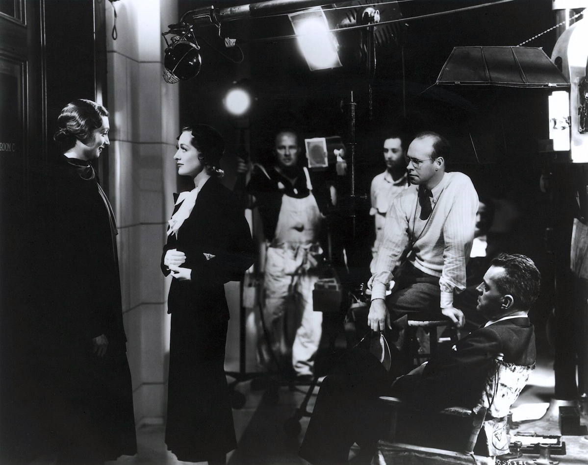 1935. On the set of 'I Live My Life.'
