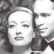 With Franchot Tone.