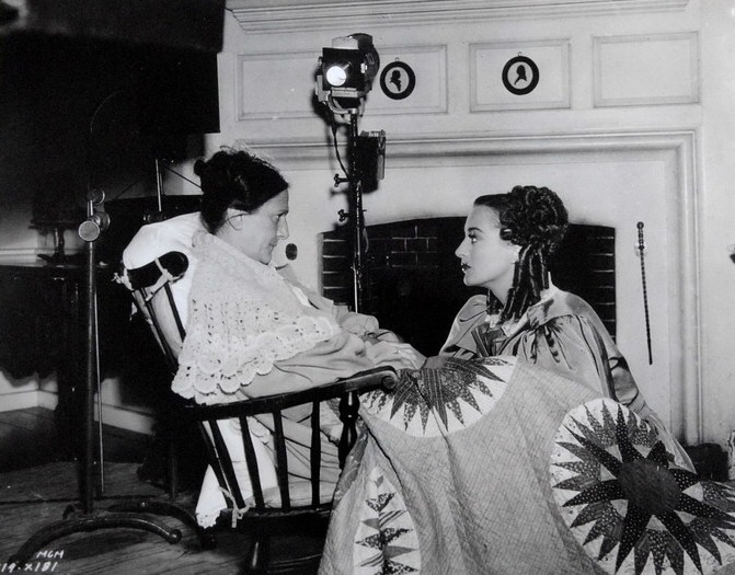 1936. On the 'Gorgeous Hussy' set with co-star Beulah Bondi.