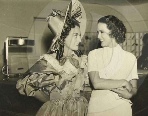 1936. On the set of 'Gorgeous Hussy' with Eleanor Powell.