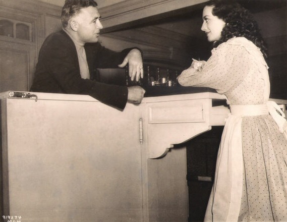 1936. On the set of 'Gorgeous Hussy' with director Clarence Brown.