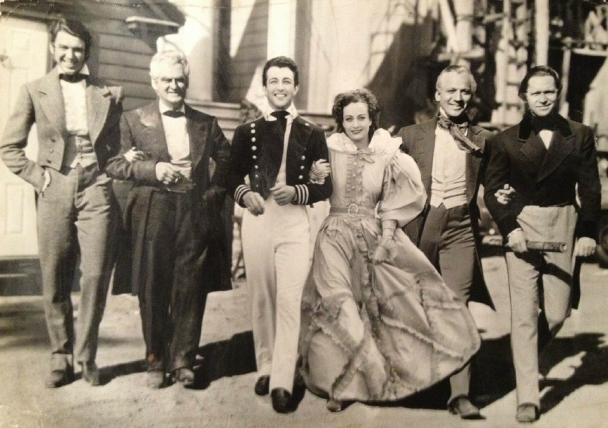 1936. On the set with the men of 'The Gorgeous Hussy.'