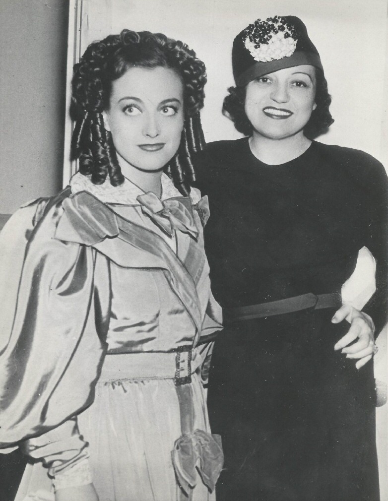 July 2, 1936. On the set of 'Gorgeous Hussy' with opera star Rosa Ponselle.