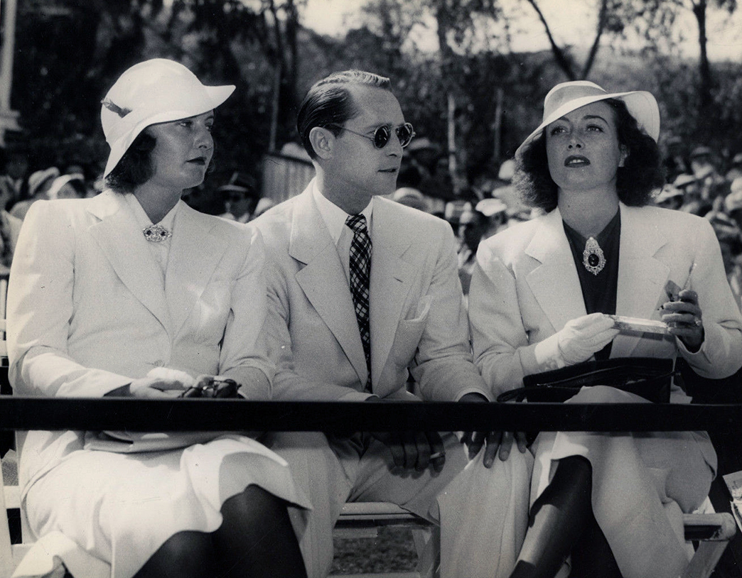 July 23, 1936. At the Will Rogers Polo Field in LA with Barbara Stanwyck and Franchot Tone.