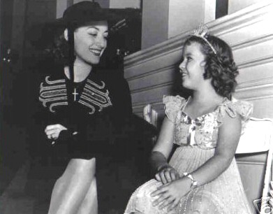 1938. With Shirley Temple.