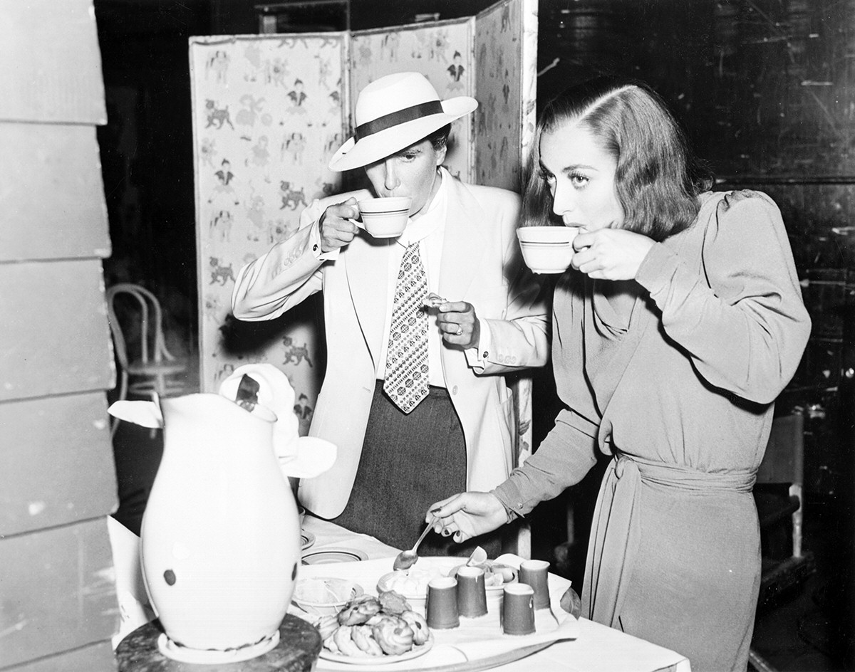 1937. On the set of 'The Bride Wore Red' with director Dorothy Arzner.